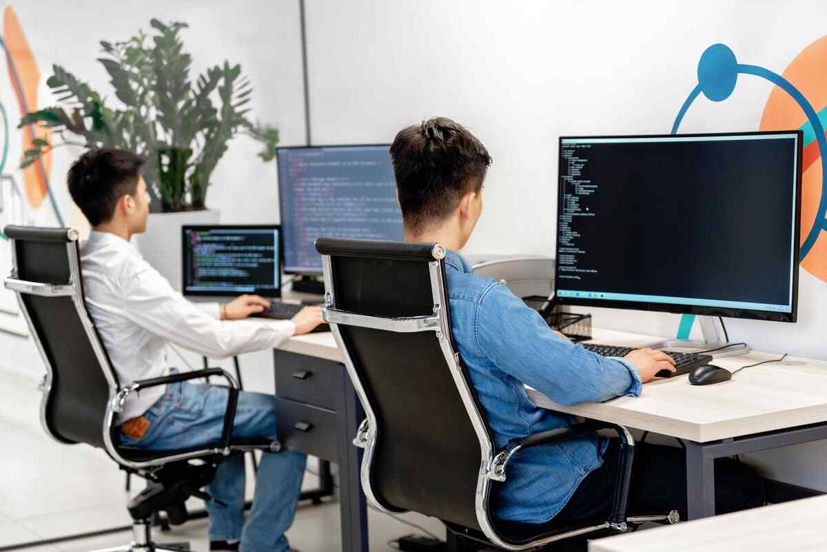 Software developers working at a desk